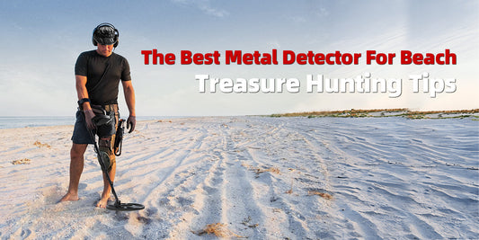 A man with a metal detector searches for treasures on a sandy beach